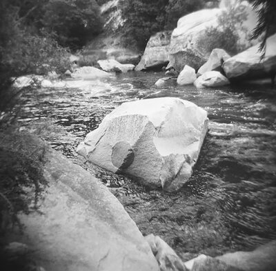boulder in a stream